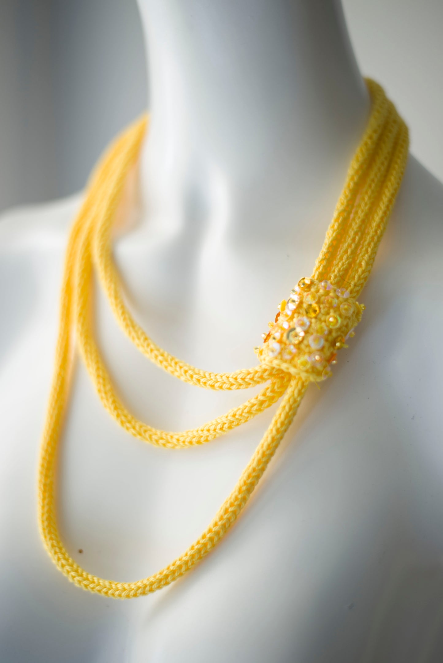 Yellow cable knitted necklace