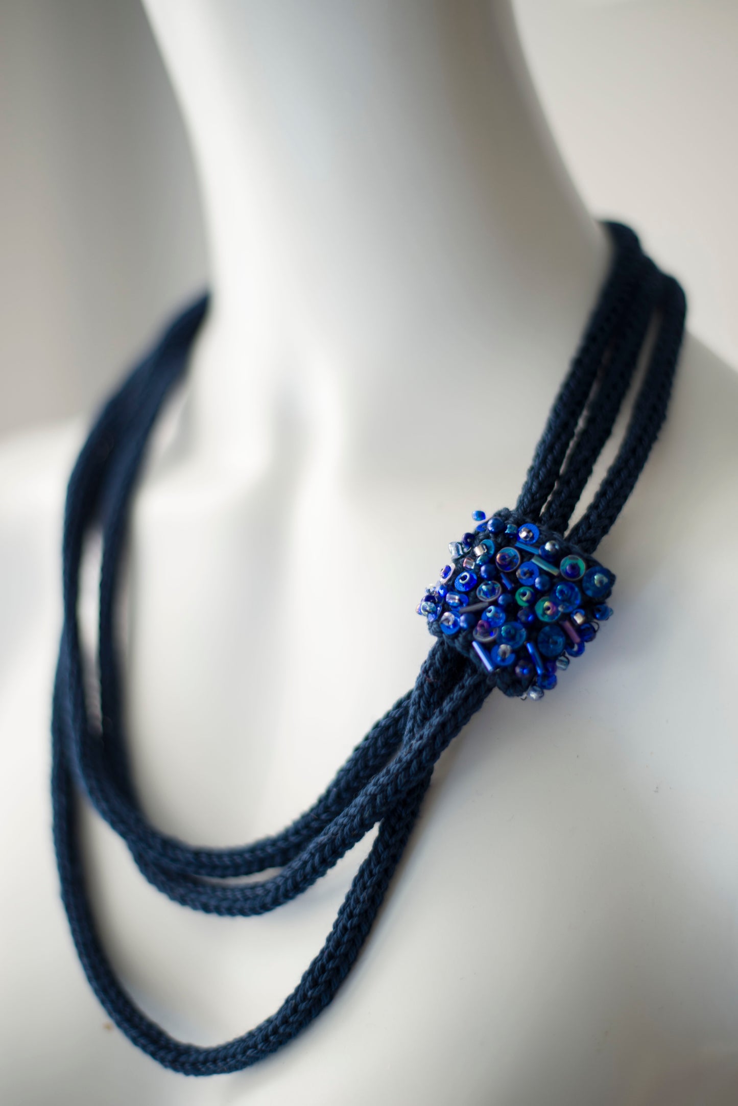 Navy blue cable knitted necklace