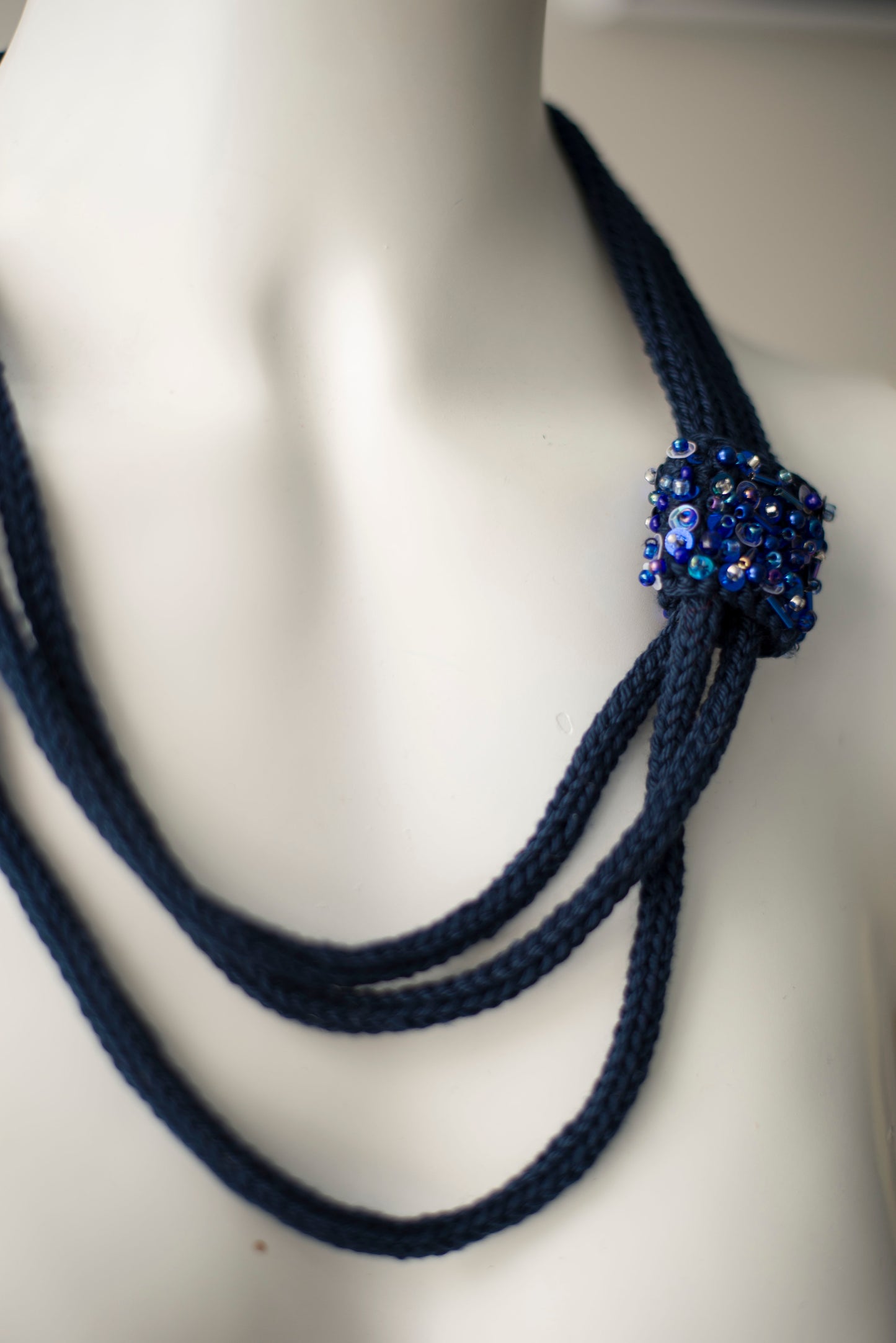 Navy blue cable knitted necklace