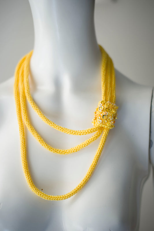 Yellow cable knitted necklace